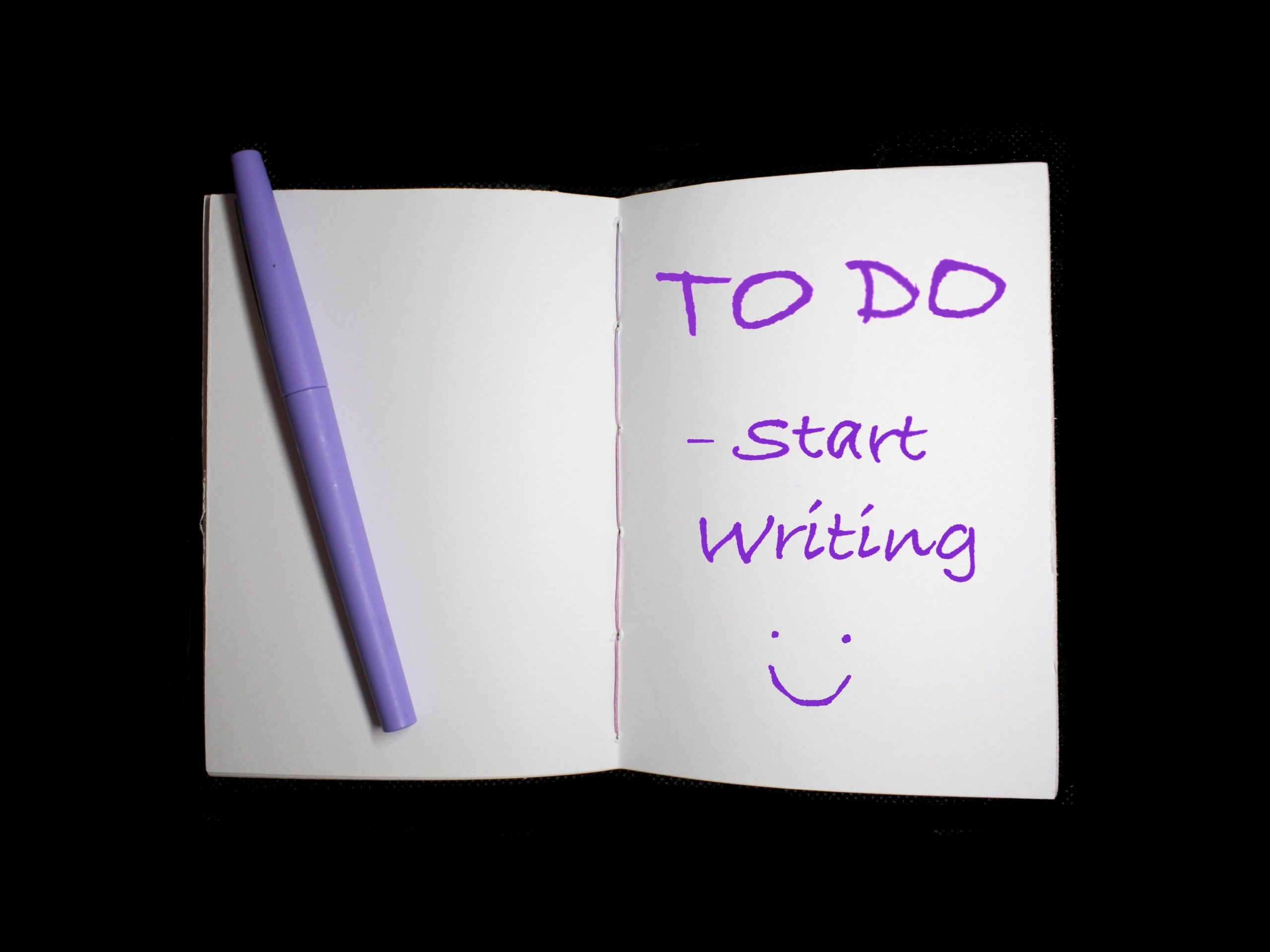 notebook open to "to do - start writing"